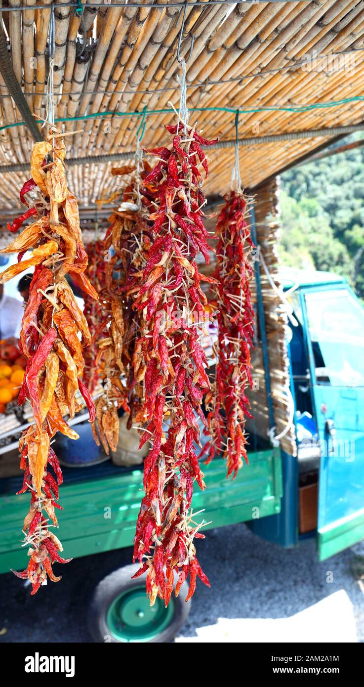 Red hot chili peppers on sale at a roadside truck stop in Italy Stock
