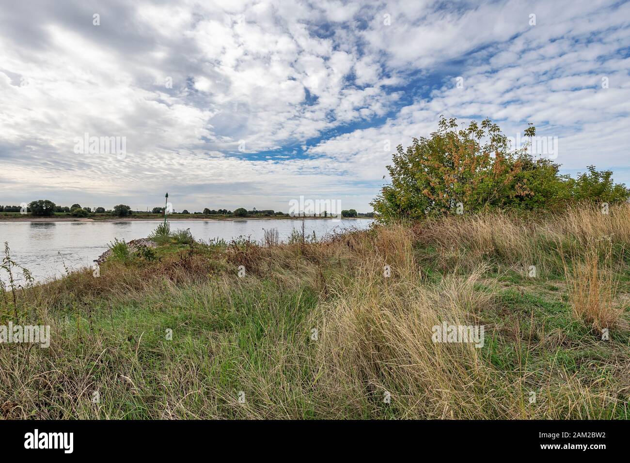 Duisburg - View from River Rhine at Duisburg-Friemersheim towards Krefeld-Hohenbudberg, North Rhine Westphalia, Germany, Duisburg, 09.09.2018 Stock Photo