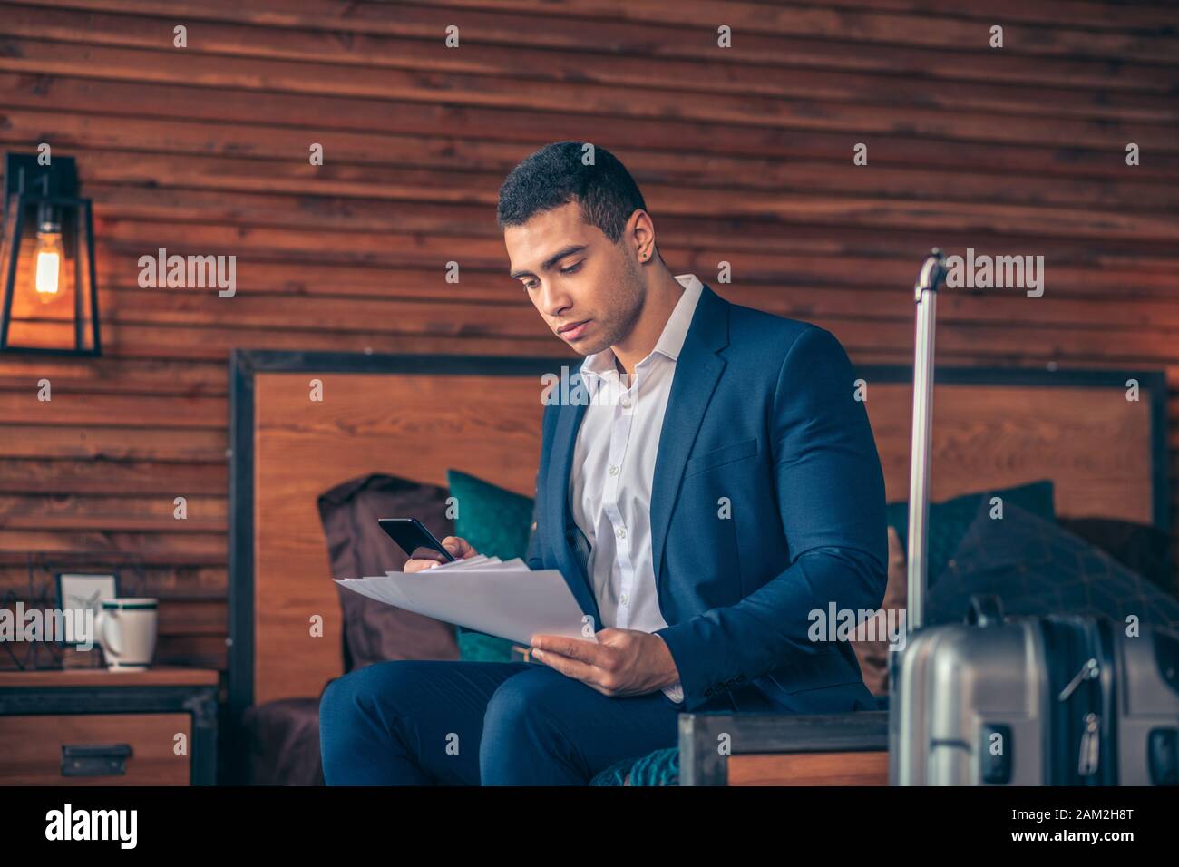 Concentrated handsome man in jacket hi-res stock photography and images ...