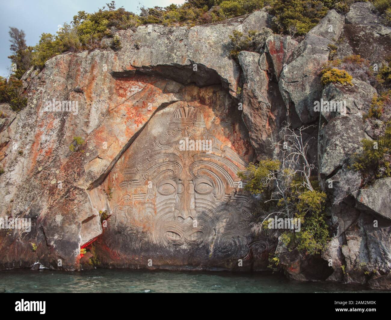Mine Bay Maori Rock Carvings in Taupo, North Island, New Zealand Stock Photo