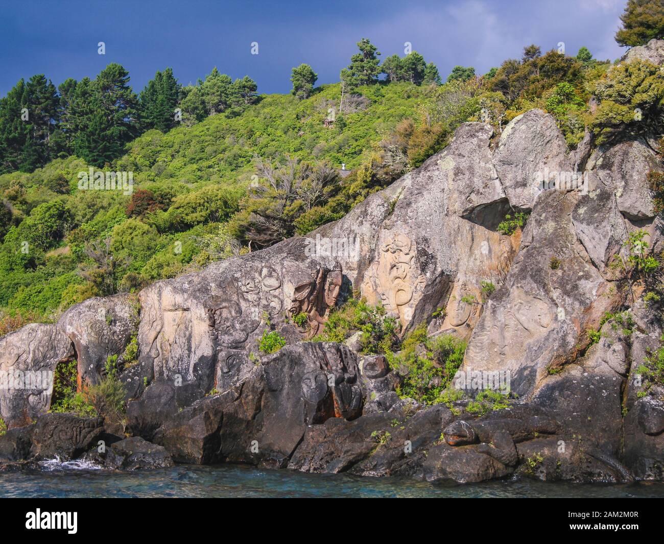 Mine Bay Maori Rock Carvings in Taupo, North Island, New Zealand Stock Photo