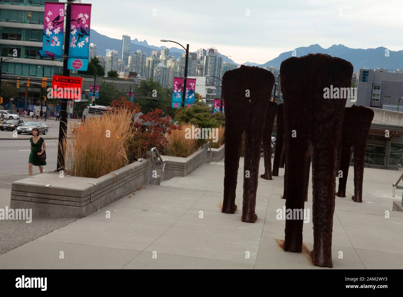 Walking Figures sculptures, Cambie Street, Vancouver, Canada Stock Photo