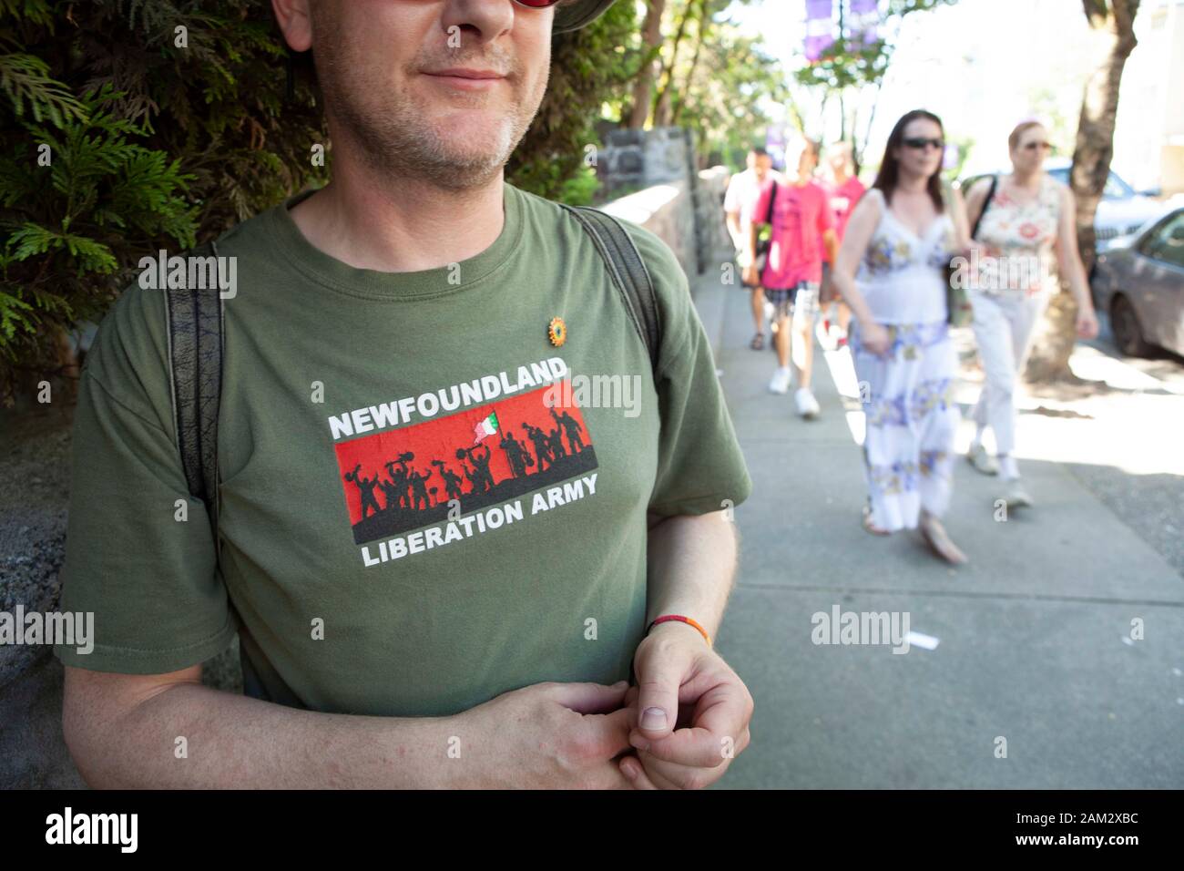 Man wearing t-shirt with slogan on way to Pride parade, Vancouver Pride Festival 2014, Vancouver, Canada Stock Photo