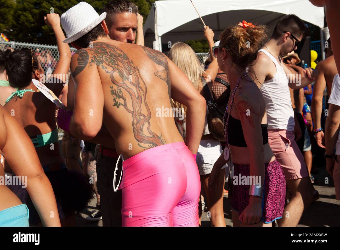 Crowd dancing in sun at festival, Vancouver Pride Festival 2014, Vancouver, Canada Stock Photo