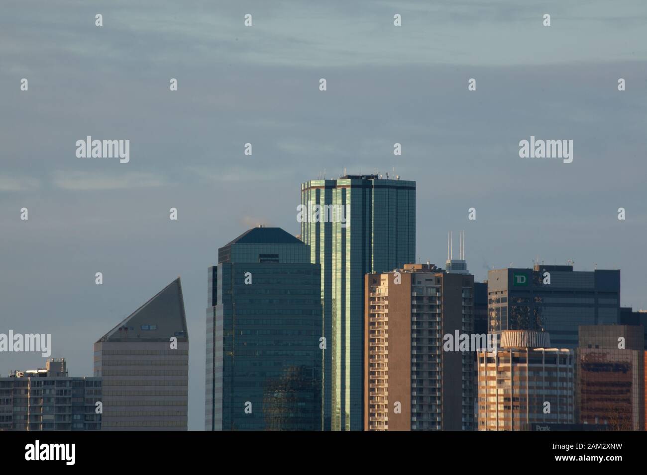 Skyline of skyscrapers and modern office buildings against overcast sky, Edmonton, Alberta, Canada Stock Photo