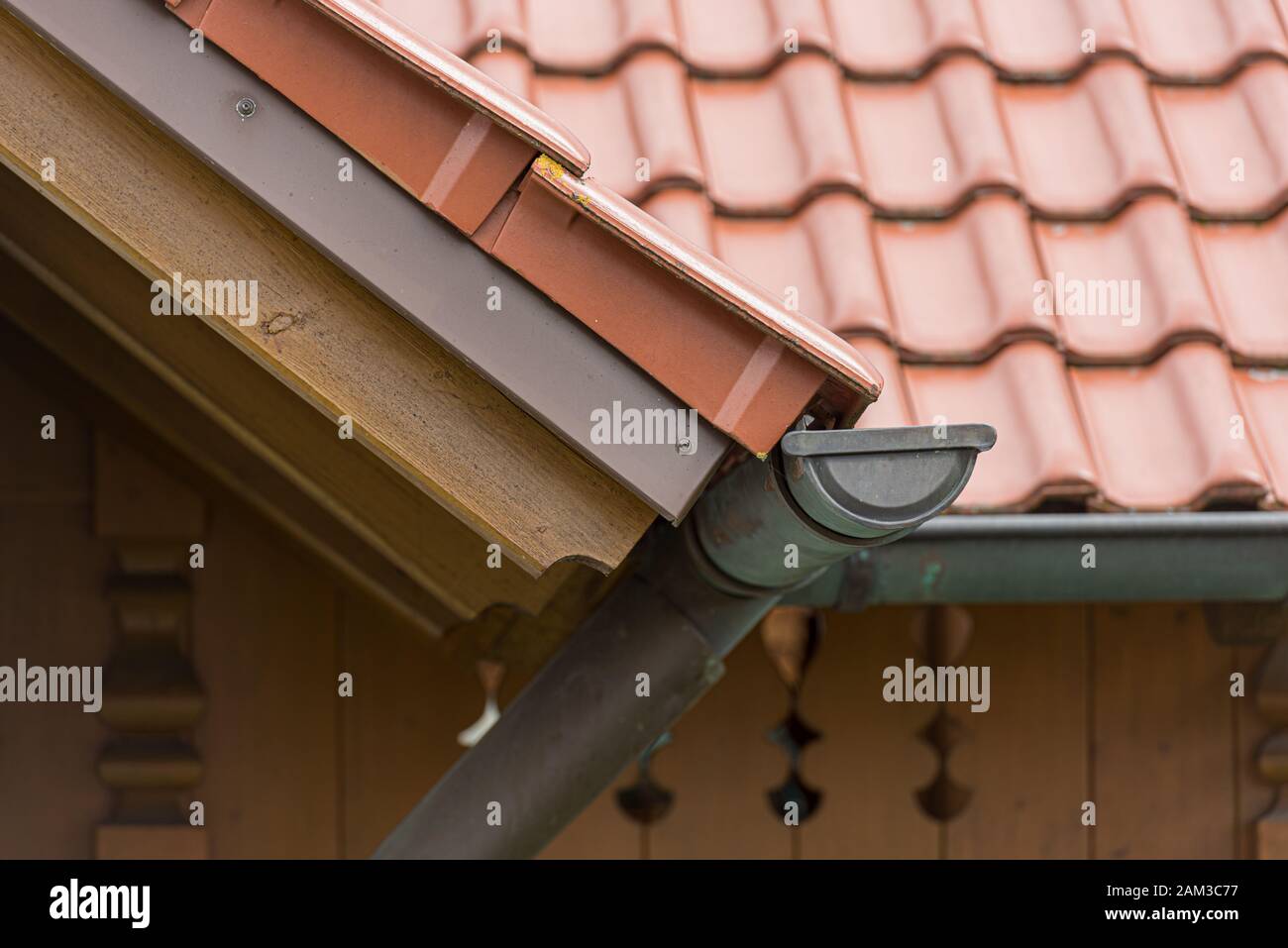 Gutter made of copper sheet. Gutter construction with downpipe Stock