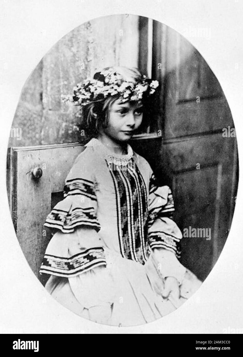 ALICE LIDDELL (1852-1934) aged seven photographed by Lewis Carroll Stock Photo