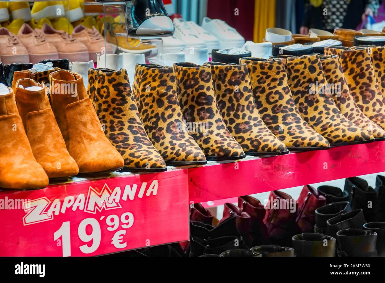 Benidorm old town, Alicante Province, Spain. Zapamania, row of ladies boots including leopard skin printed ones. Stock Photo