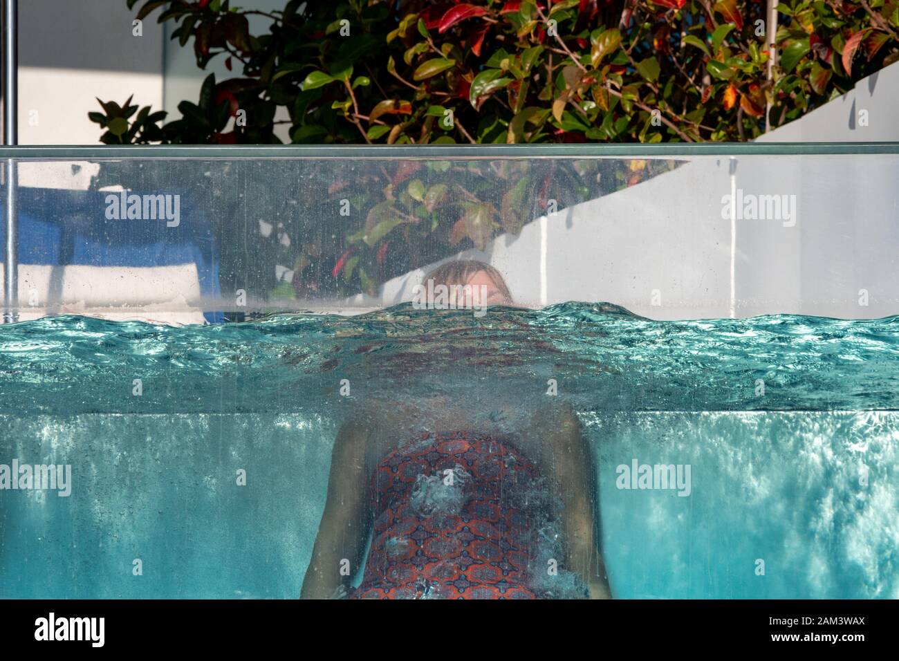 Plunge pool woman hi-res stock photography and images - Alamy
