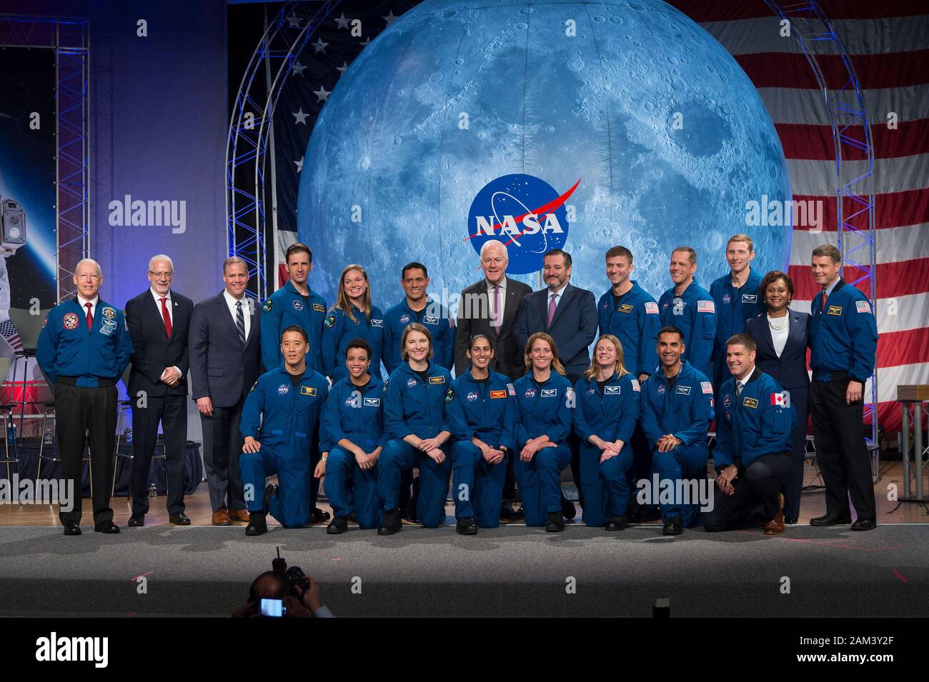 HOUSTON, TEXAS - 10 Jan 2020 -  The 2017 Class of Astronauts poses for a portrait with NASA officals and Texas Senators at the Johnson Space Center in Stock Photo