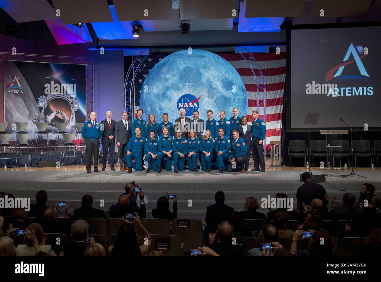 HOUSTON, TEXAS - 10 Jan 2020 -  The 2017 Class of Astronauts poses for a portrait with NASA officals and Texas Senators at the Johnson Space Center in Stock Photo