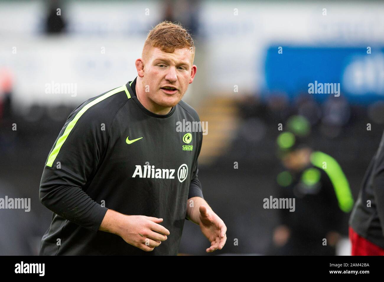 Swansea, UK. 11th Jan, 2020. Saracens prop Rhys Carre warms up ahead of the Ospreys v Saracens Heineken Champions Cup Rugby Match. Credit: Gruffydd Ll. Thomas/Alamy Live News Stock Photo