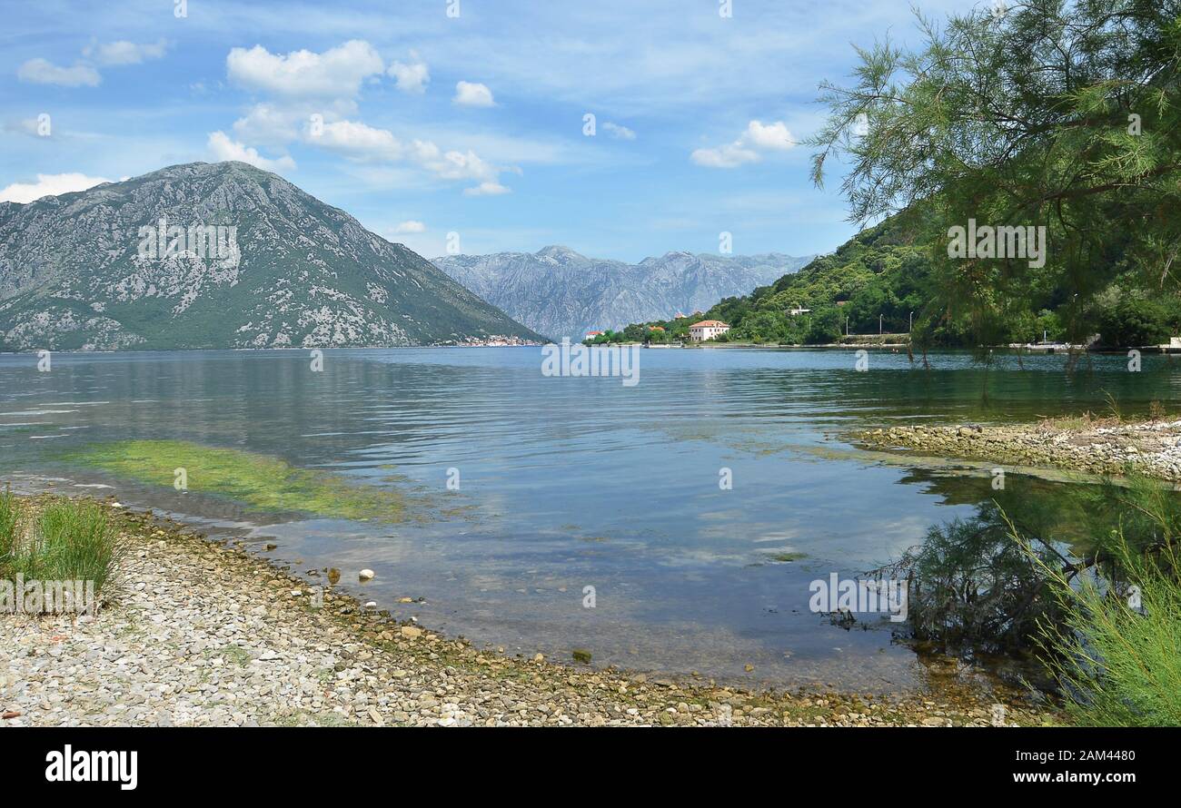 Kotor Bay with Perast village and Mount Lovcen in the far distance, Montenegro Stock Photo