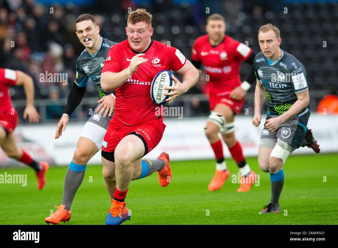 Swansea, UK. 11th Jan, 2020. Saracens prop Rhys Carre on the attack in the Ospreys v Saracens Heineken Champions Cup Rugby Match. Credit: Gruffydd Ll. Thomas/Alamy Live News Stock Photo