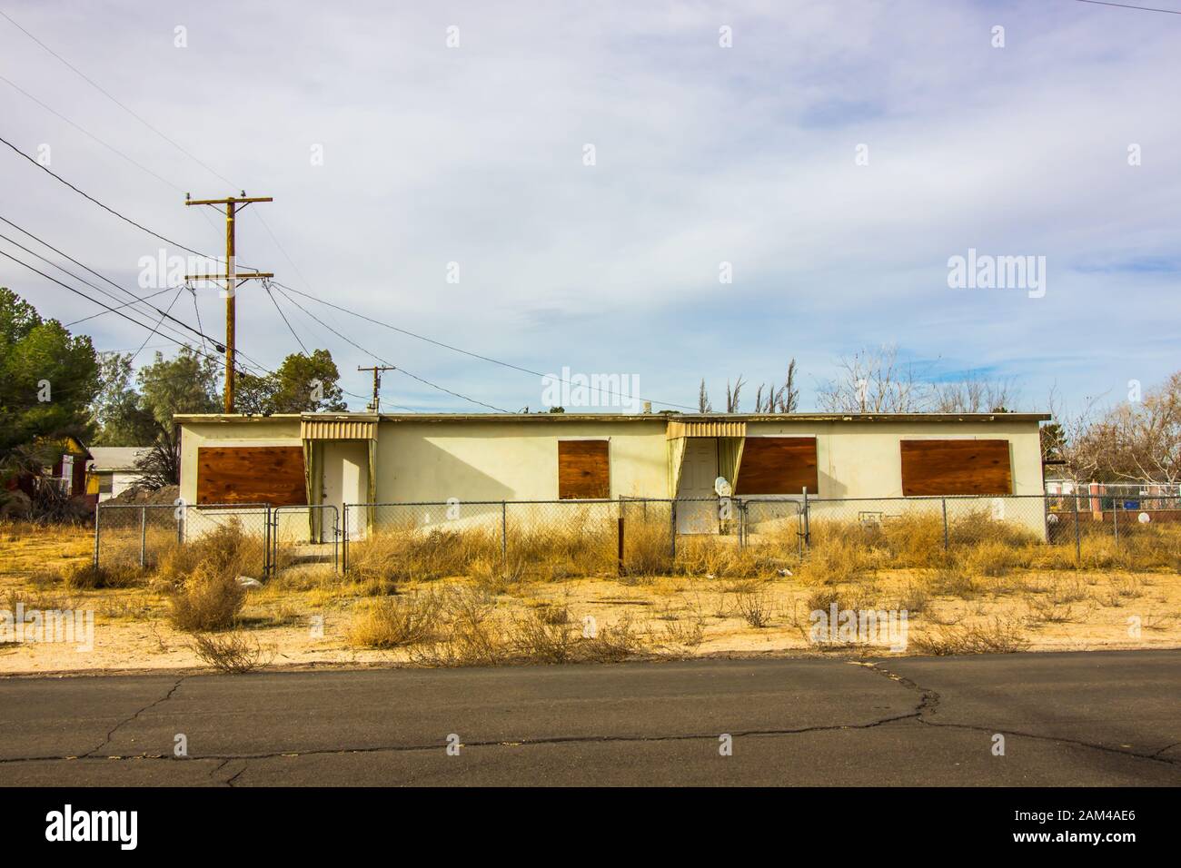 Abandoned Duplex With Boarded Up Windows Stock Photo - Alamy