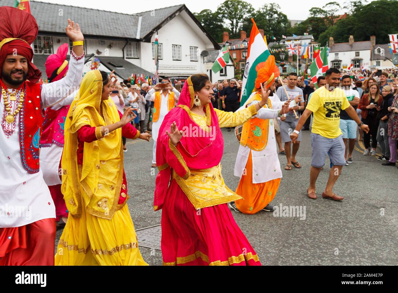 People in Indian national costume at the International Musical Eisteddfod street parade in Llangollen Stock Photo