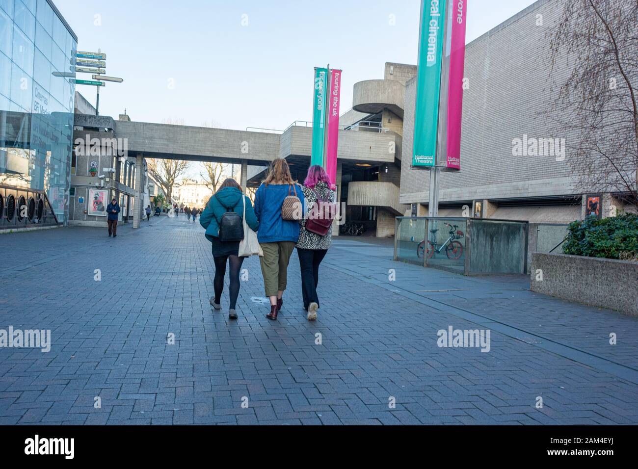 People walking along the Theatre Aveneue, a pedestrian only street alongside the National Theatre, South Bank, Waterloo, London Stock Photo