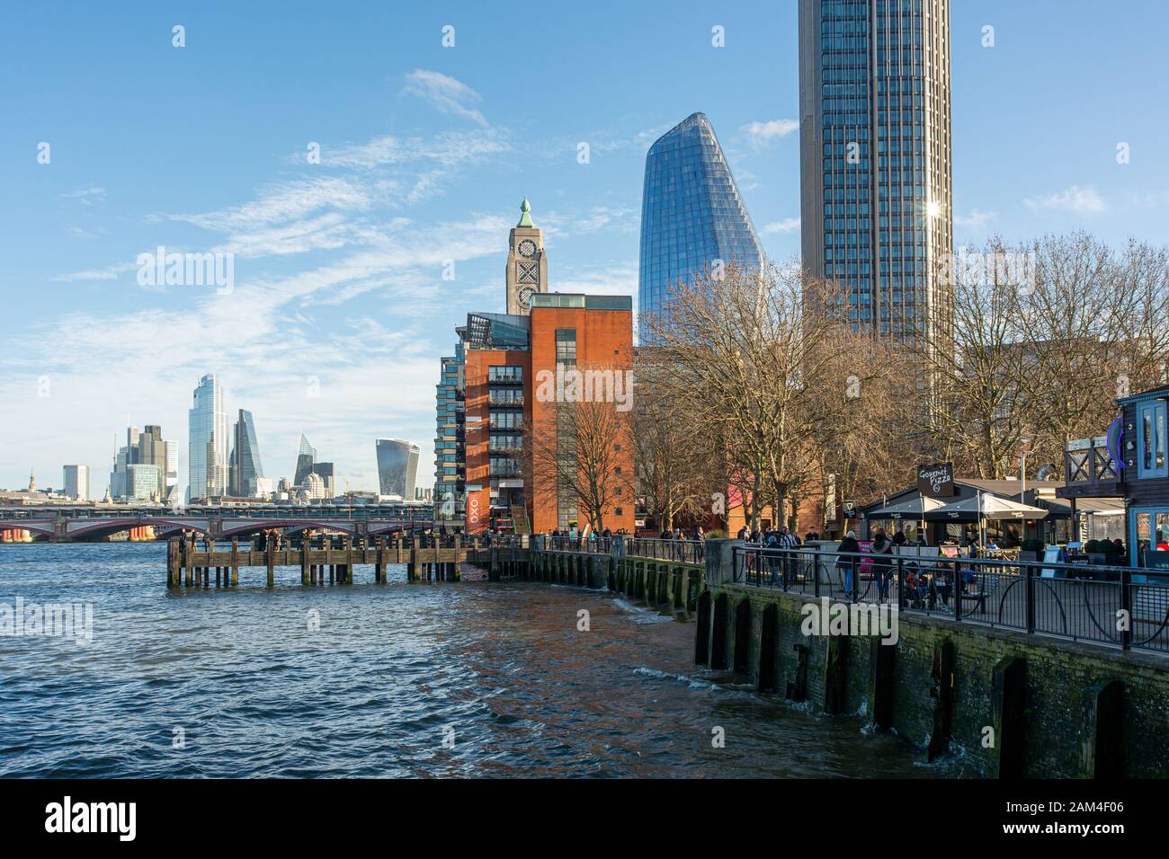 South Bank of the River Thames with the Oxo Tower Wharf, One Blackfriars and The South Bank Tower on a sunny winter day, London Stock Photo