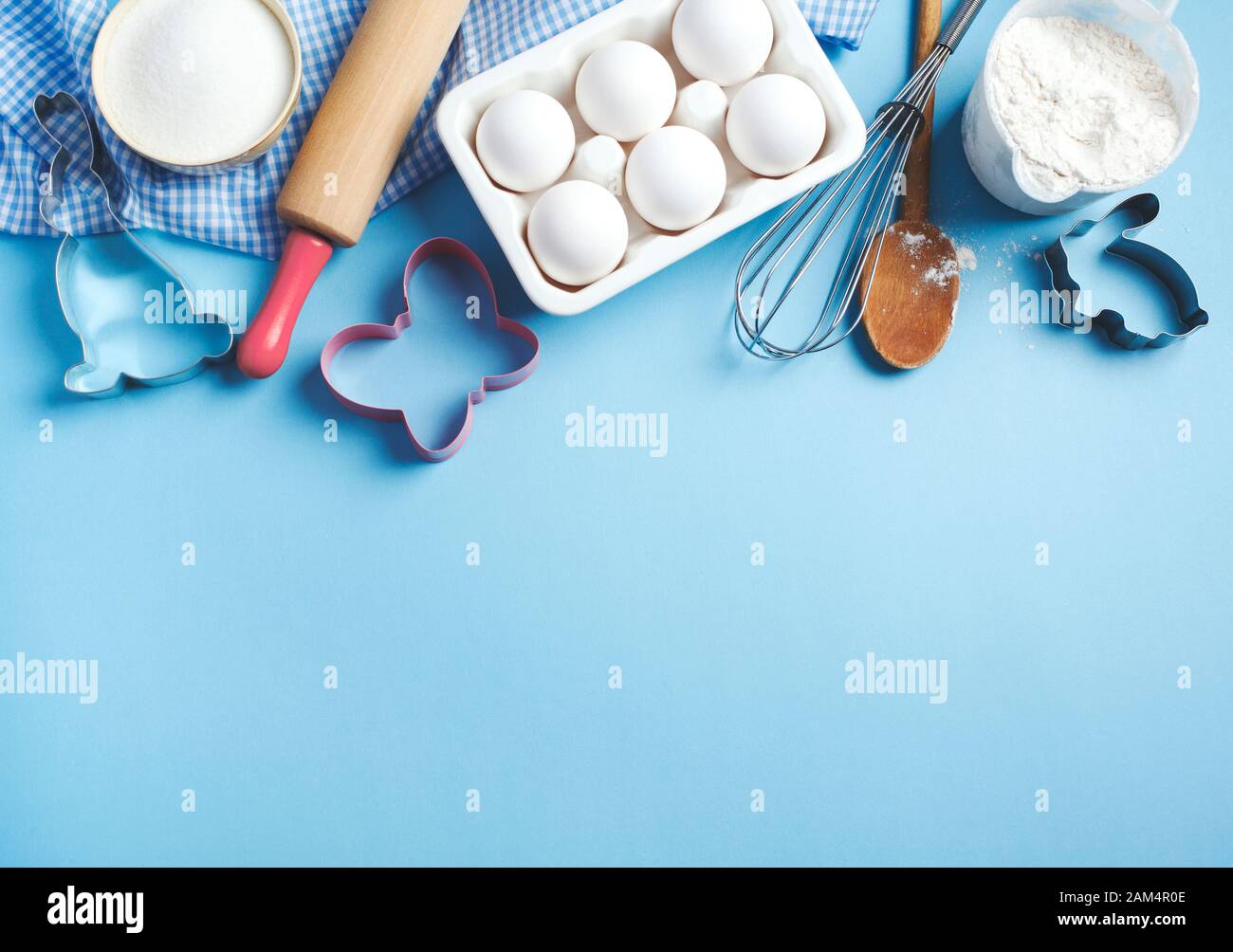 https://c8.alamy.com/comp/2AM4R0E/baking-background-frame-preparation-for-easter-baking-ingredients-and-kitchen-items-for-baking-kitchen-utensils-flour-eggs-sugar-top-view-copy-2AM4R0E.jpg