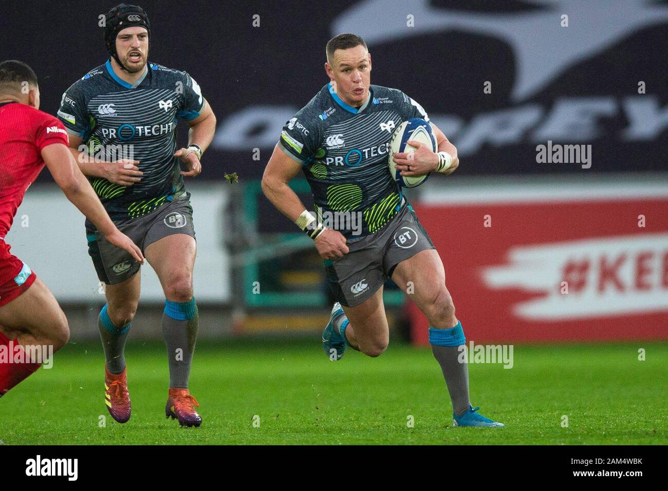 Swansea, UK. 11th Jan, 2020. Ospreys right wing Hanno Dirksen on the attack in the Ospreys v Saracens Heineken Champions Cup Rugby Match. Credit: Gruffydd Ll. Thomas/Alamy Live News Stock Photo