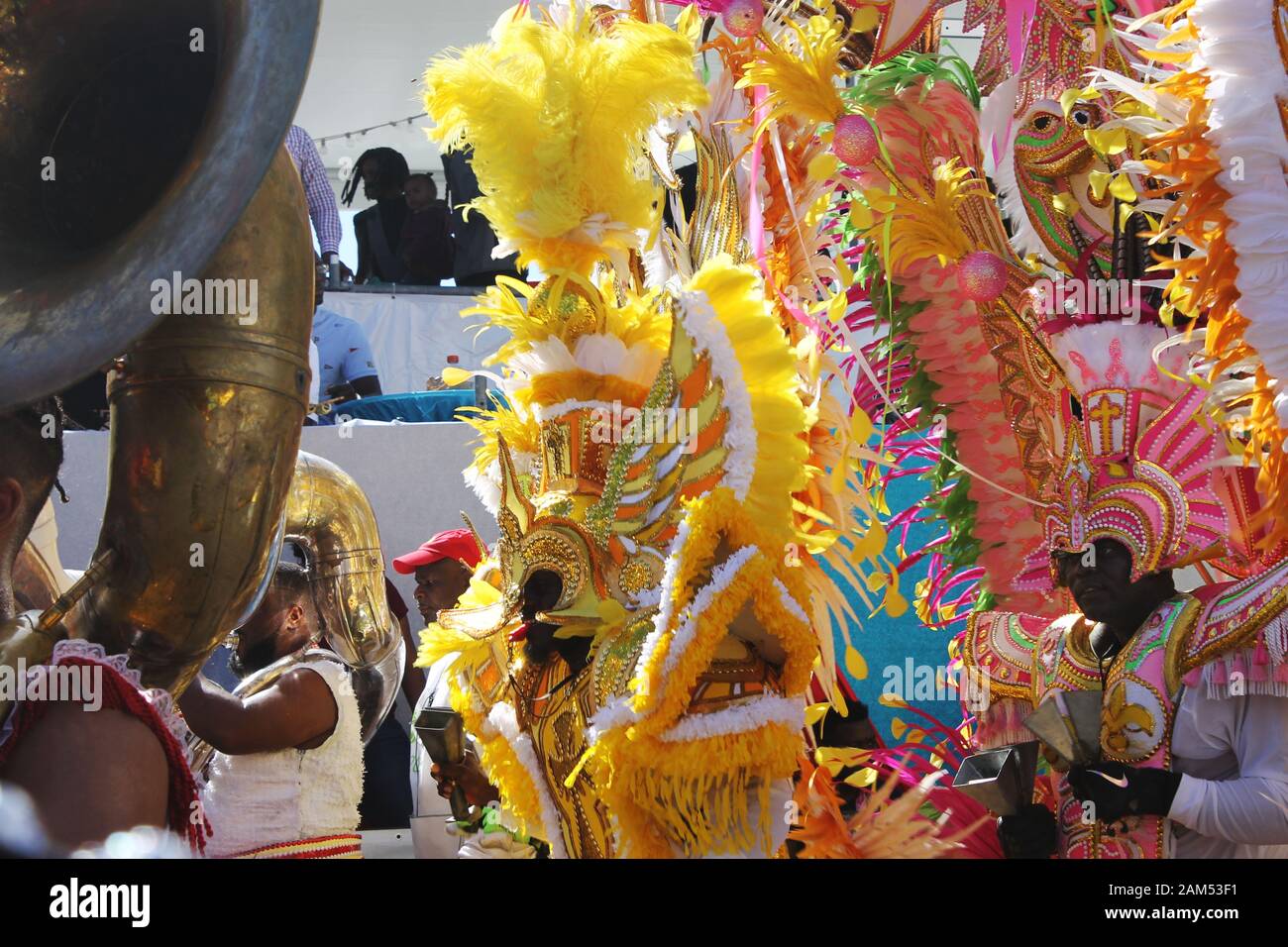 Men in bright colorful costumes at the Junkanoo street festival celebration in Nassau, The Bahamas Stock Photo