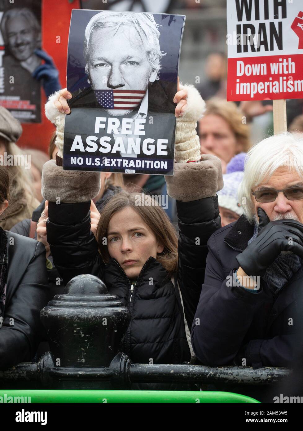 London, UK. 11th Jan 2020. Protestor supporting Julian Assange at the rally. Protestors supporting CND march through the streets of London to Trafalgar Square where there are speeches against War with Iran. Credit: Tommy London/Alamy Live News Stock Photo
