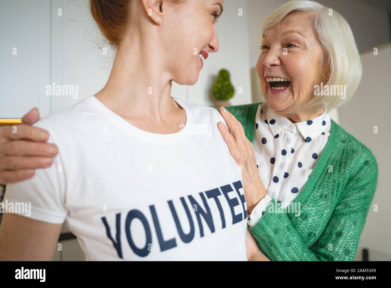 Close up of happy females that laughing at joke Stock Photo