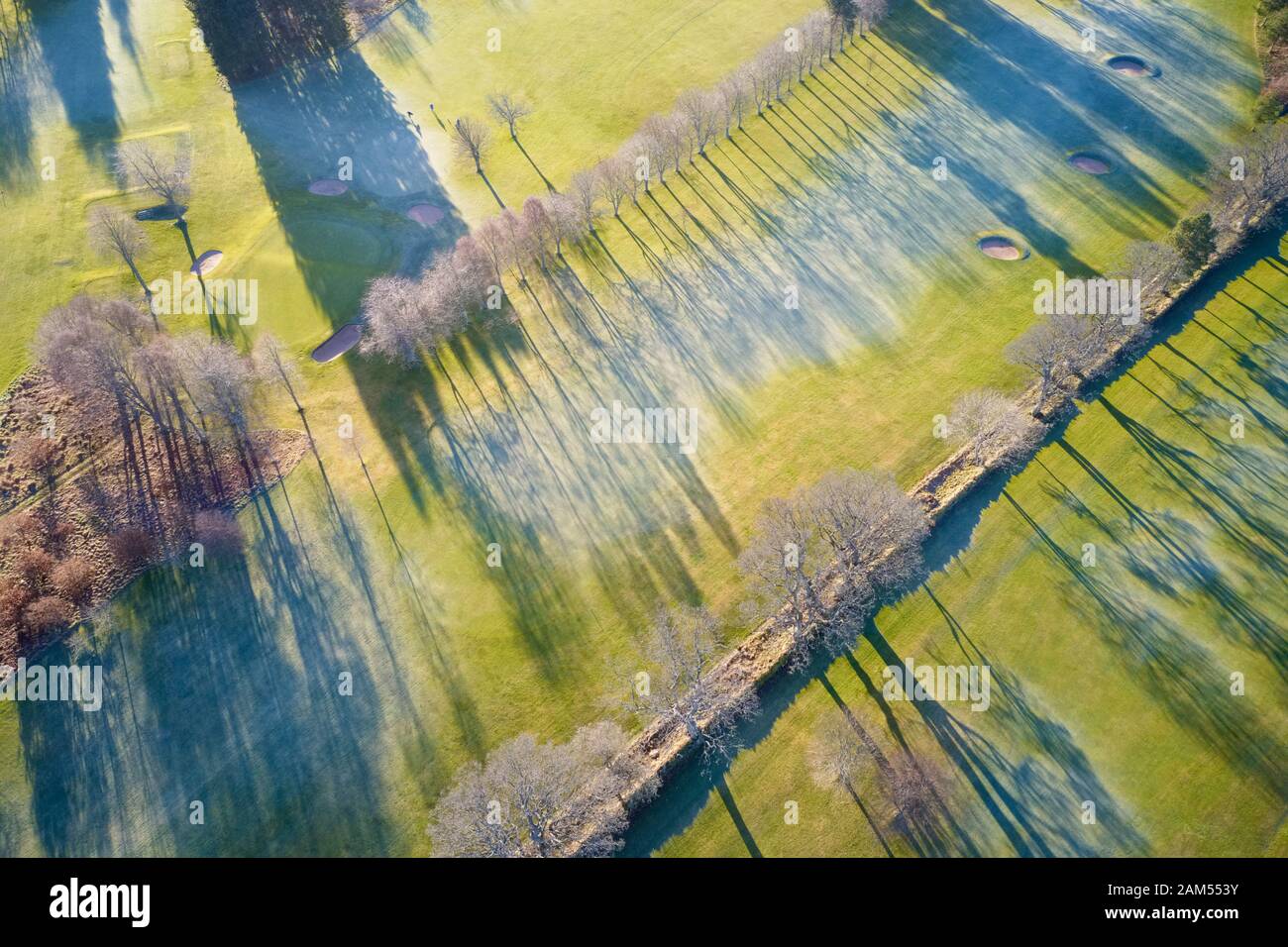 Aerial view of golf course green and clubhouse from above frozen grass in winter at Aboyne Aberdeenshire Scotland Stock Photo