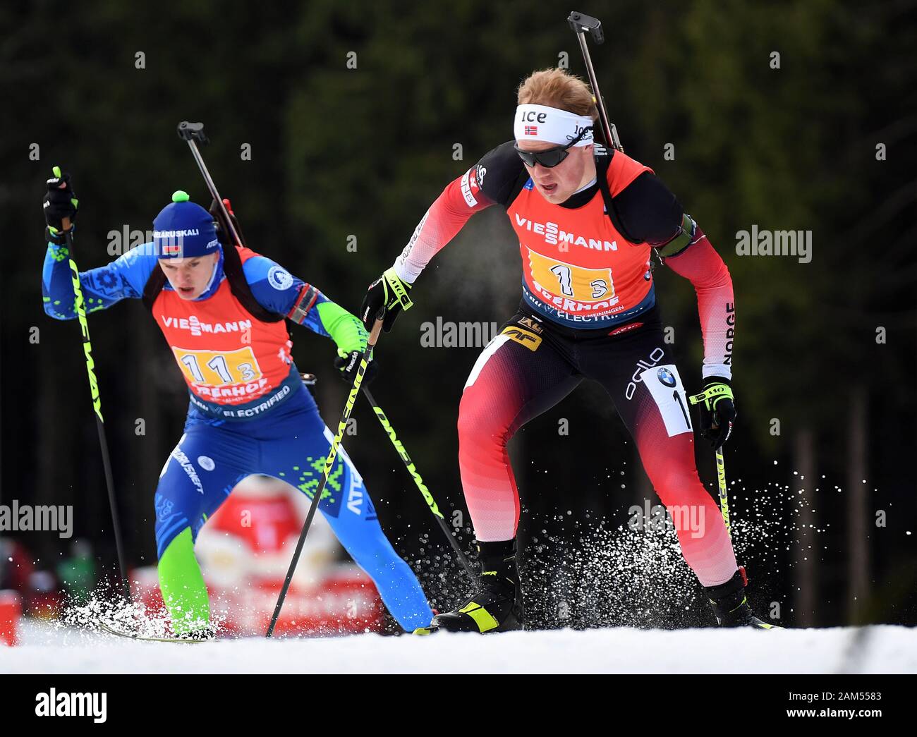 Oberhof, Germany. 11th Jan, 2020. Biathlon, World Cup, relay 4 x 7.5 km,  men. Starting runner Johannes Dale (r) from Norway will run ahead of Raman  Yaliotnau from Belarus. Credit: Hendrik Schmidt/dpa-Zentralbild/dpa/Alamy