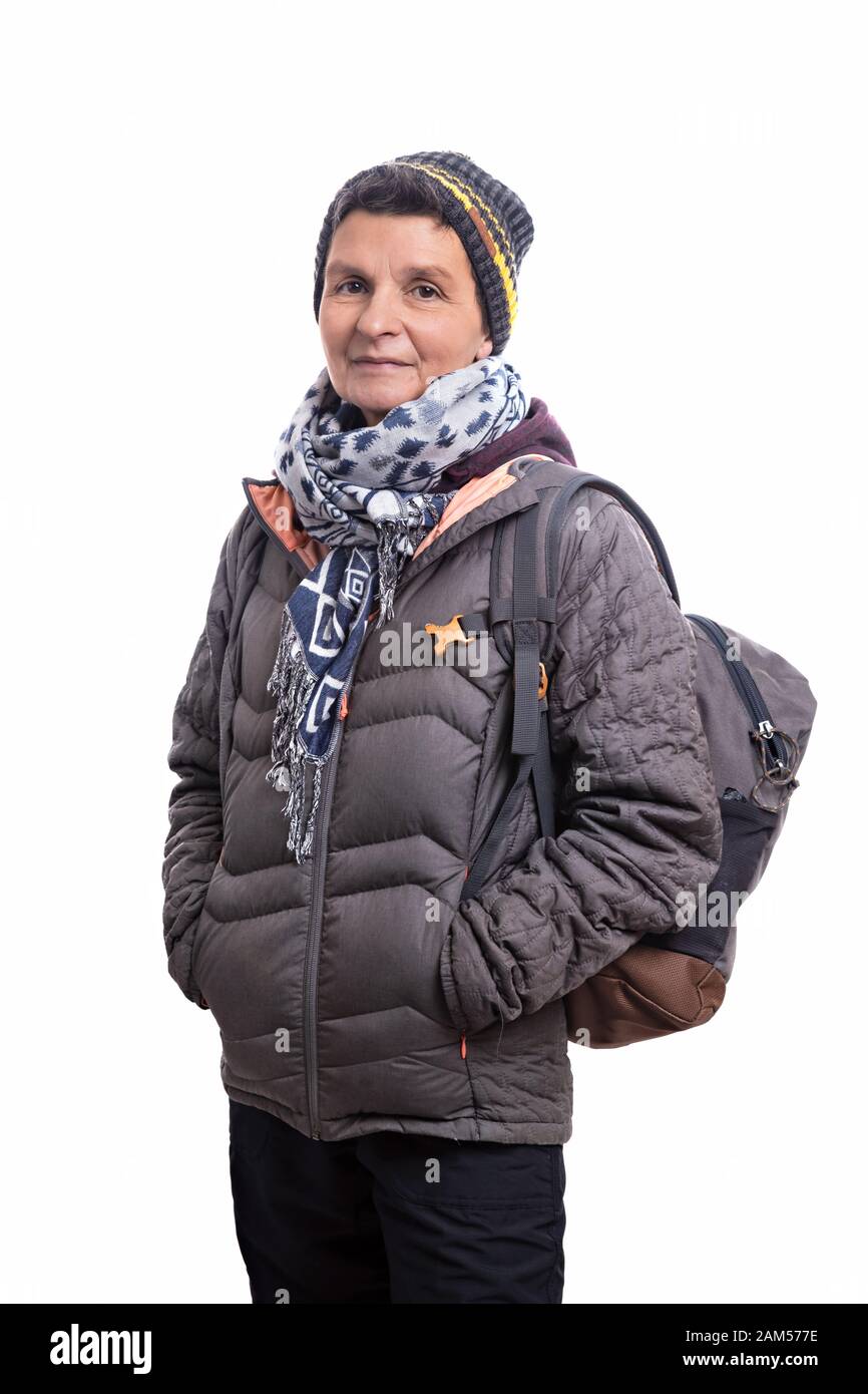 Woman wearing winter hiking outfit on white background Stock Photo