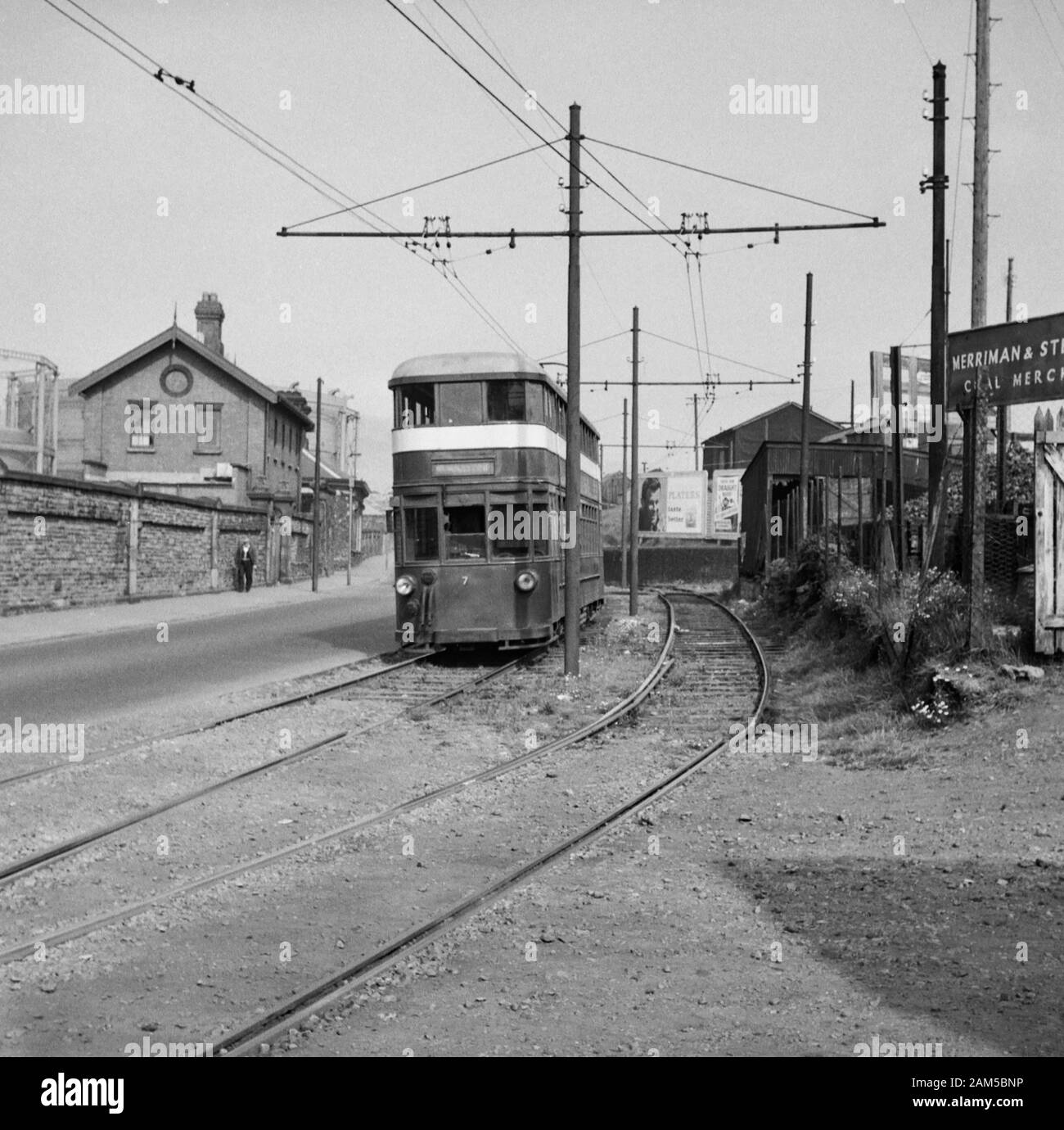Swansea and Mumbles Railway. Tram no 7 going past gasworks during the 1950s Stock Photo