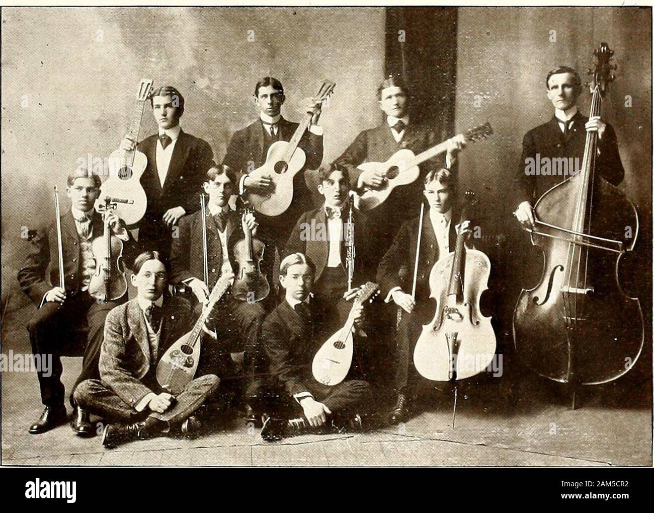 Bobashela . Glee Club. 103 THE SYMPHONY CLUB. J. K. Williams, Leader, . . .-,-.?•. First Mandolin. L. B. Robinson, . ... . Second Mandolin. C. AViNTERS, ........ Clarionet. ]. S. McWiLLiAMS, Vice-Leader, .... First ]iolin. H. Y. Pearce, ... . . Second Violin. R. A. TribblE, ... . . Violin-cello. R. L. Thompson, INIanager, ...... Guitar. R.P.Mitchell,..;   . . . . Guitar. S. M. Graham, . . . ,.,: . Guitar. E. G. MoHLER, . . . ? ? . Bass Violin. 104. vSymphonv Club. 105 ^-Aj. Stock Photo