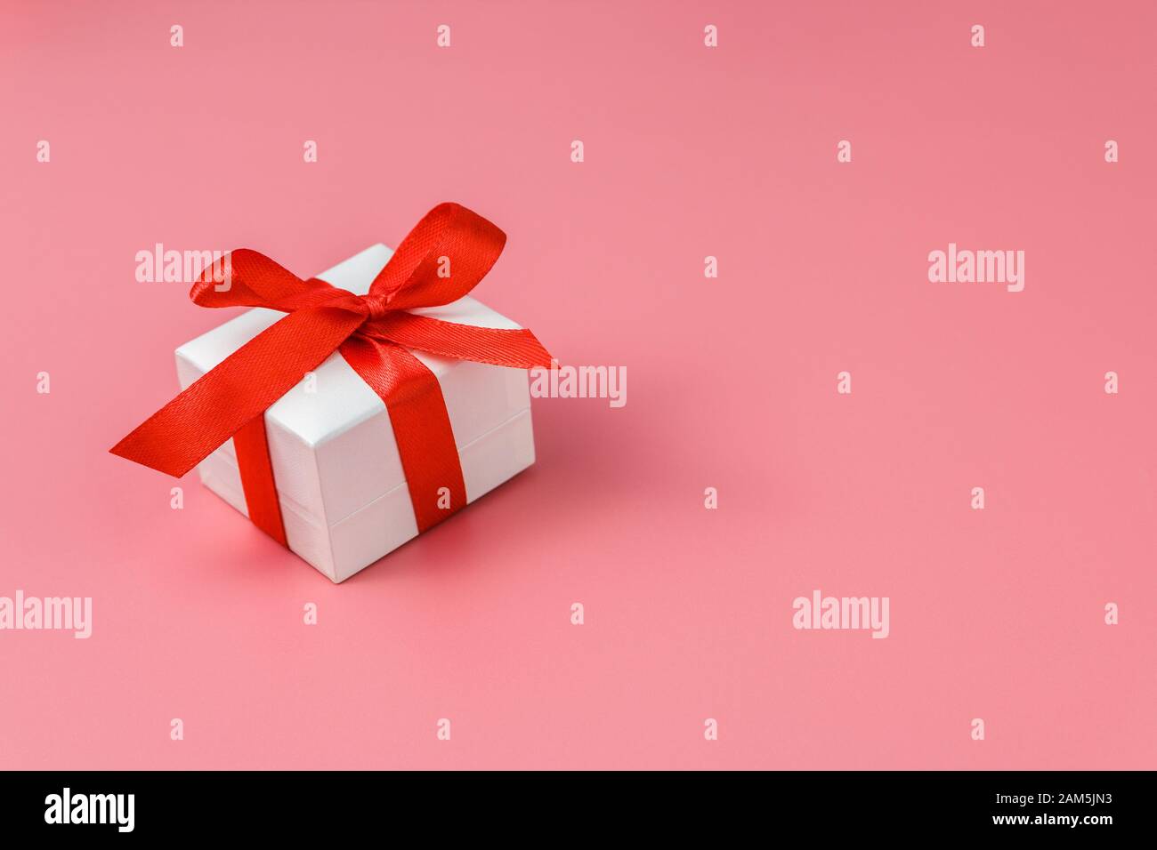 Red Strap Boxes white gift box with red strap on colour background, engagement ring box ...