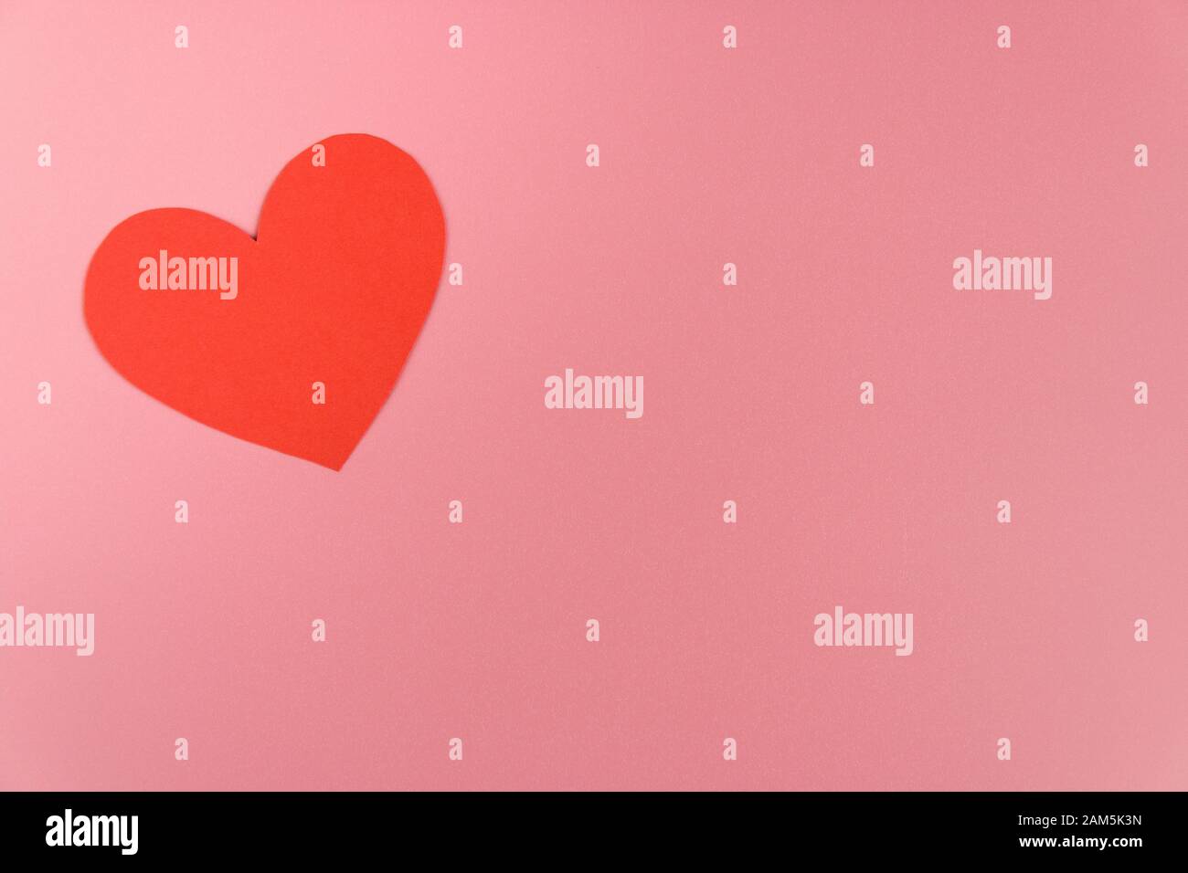 one red craft paper heart on pink background with copy space Stock ...