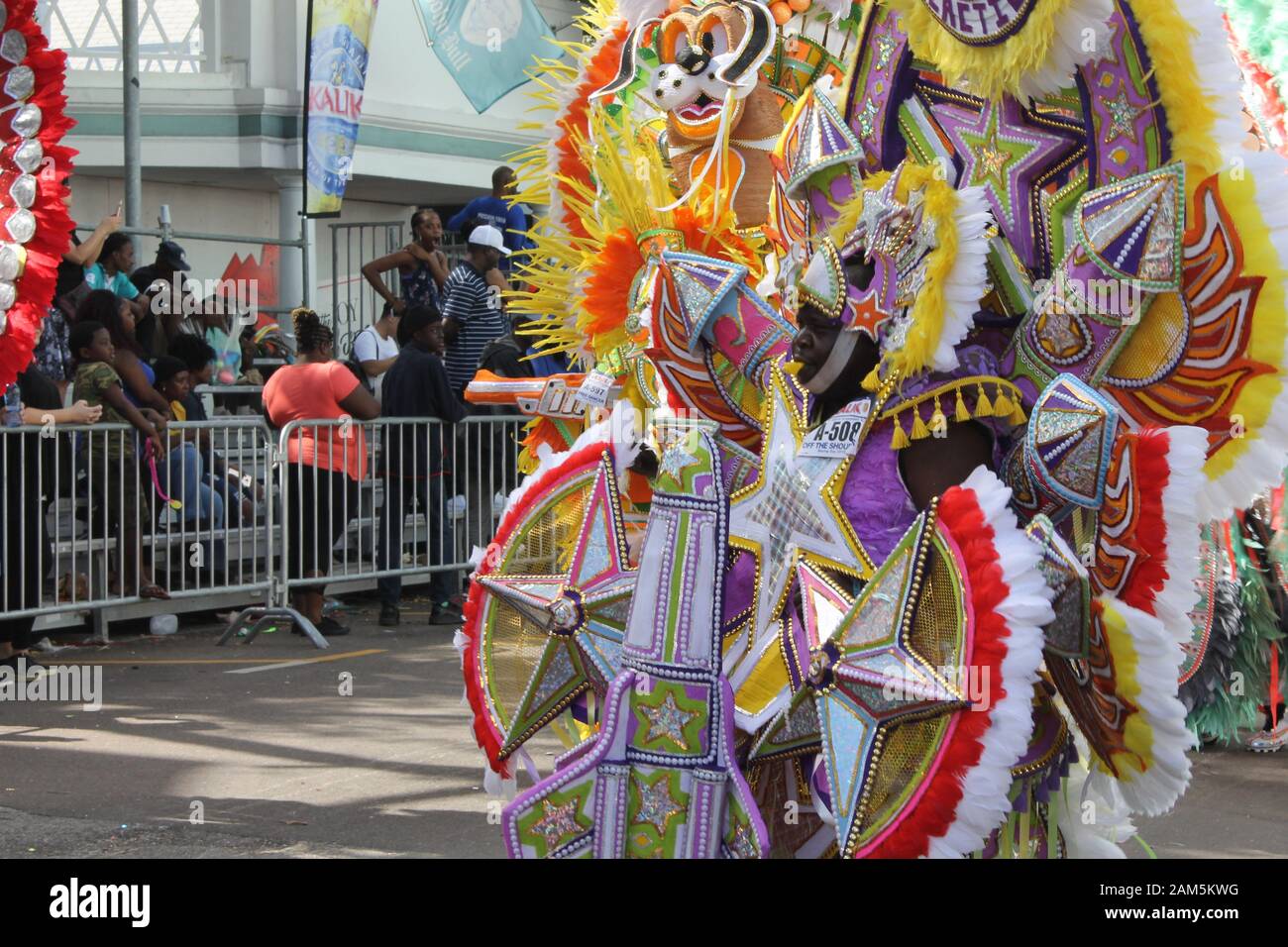 Man in giant costume at the Junkanoo festival celebration on Boxing Day in Nassau, the Bahamas Stock Photo