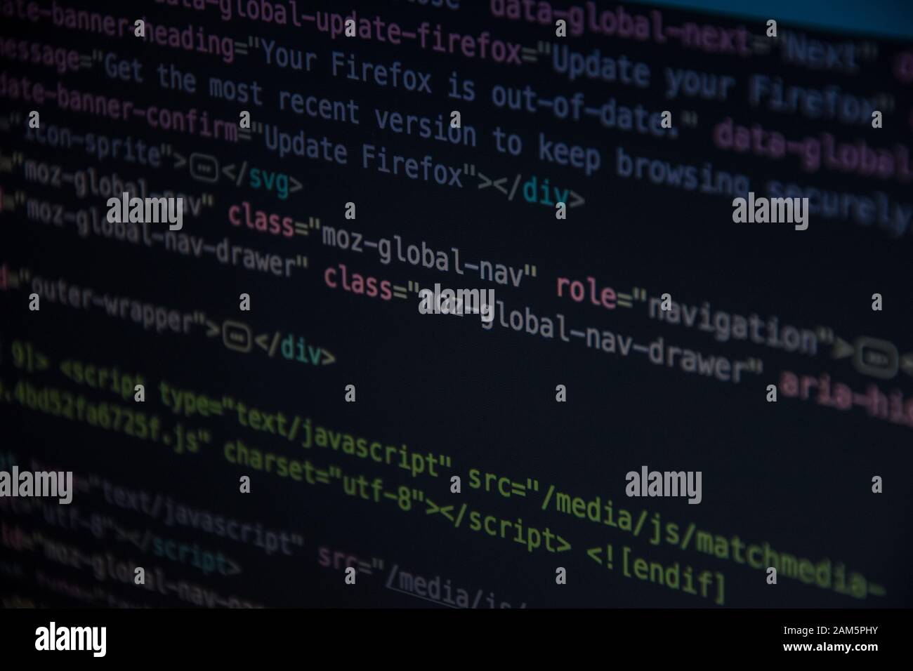 Close up css HTML code on monitor screen with black background Stock Photo  - Alamy