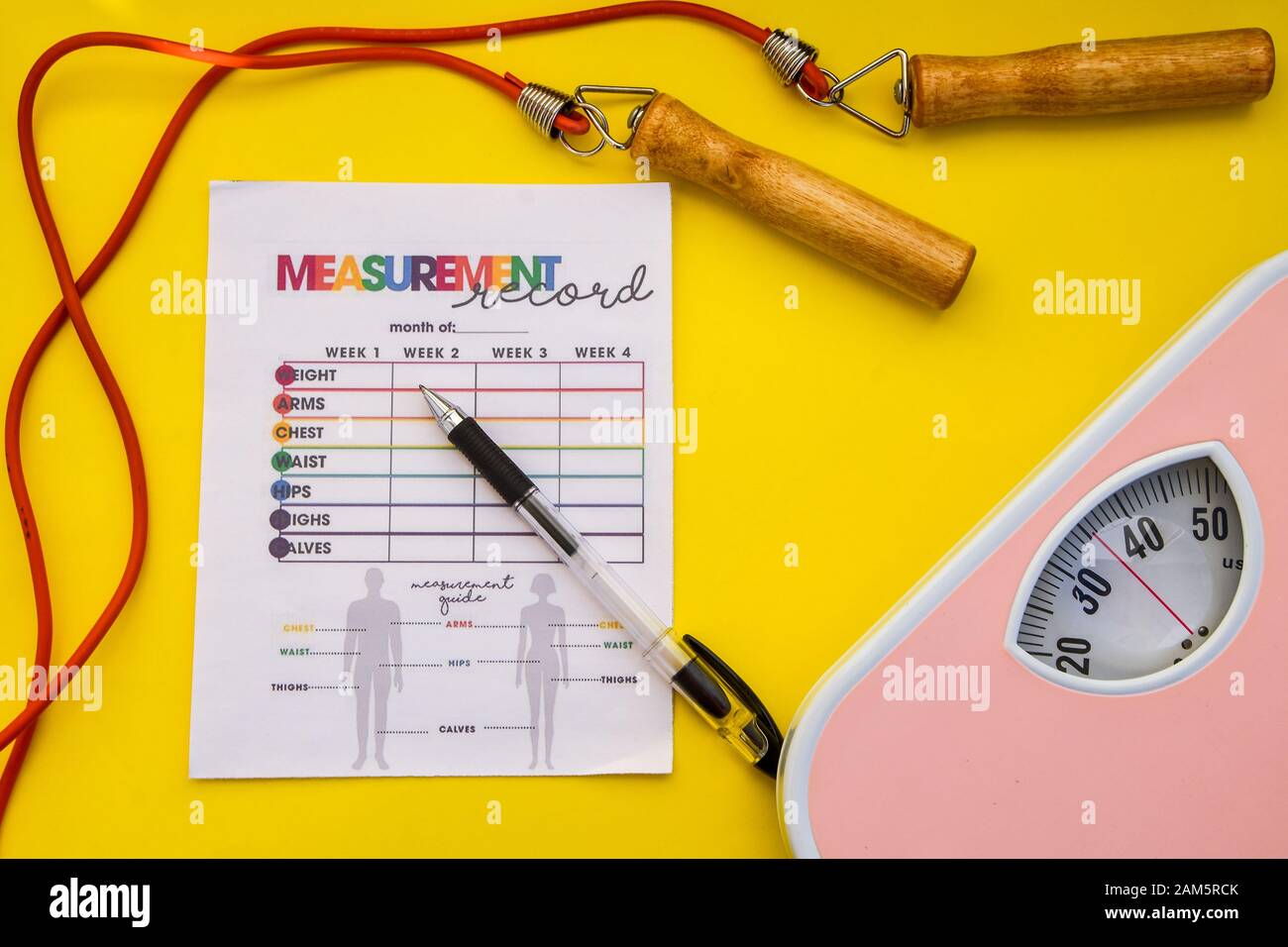 Modern weight scale with jumping rope stock photo Stock Photo Alamy