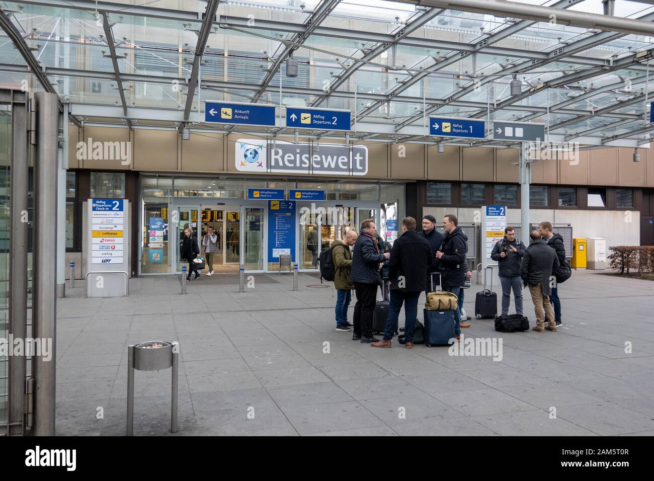 Passengers waiting to check in at Nuremberg Airport Stock Photo Alamy