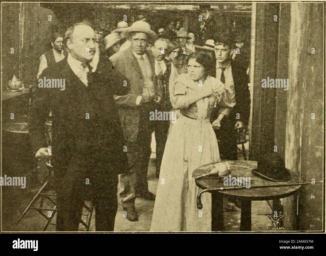 Cinema News and Property Gazette (1912) . the vmu SPECANNOUNCE of the Powerful and THE MILLS FROM THE NOVEL B Approximate Total Length 3,079 feet. Ir THE MOST VIGOROUS ACTING BY THE A Modern Drama that palpitates with fire and power. AN EXPERTS. A FILM YOU CANNOT Remember, its i All Subjects Supplied ot THE VITAGRAPH 15 and 17.CECICHARING CROS Telegrams— VITGRAF, LONDON. &lt; December, 1912. THE CINEMA. 41 GRAPH CO., Ltd. IAL MENT Stock Photo