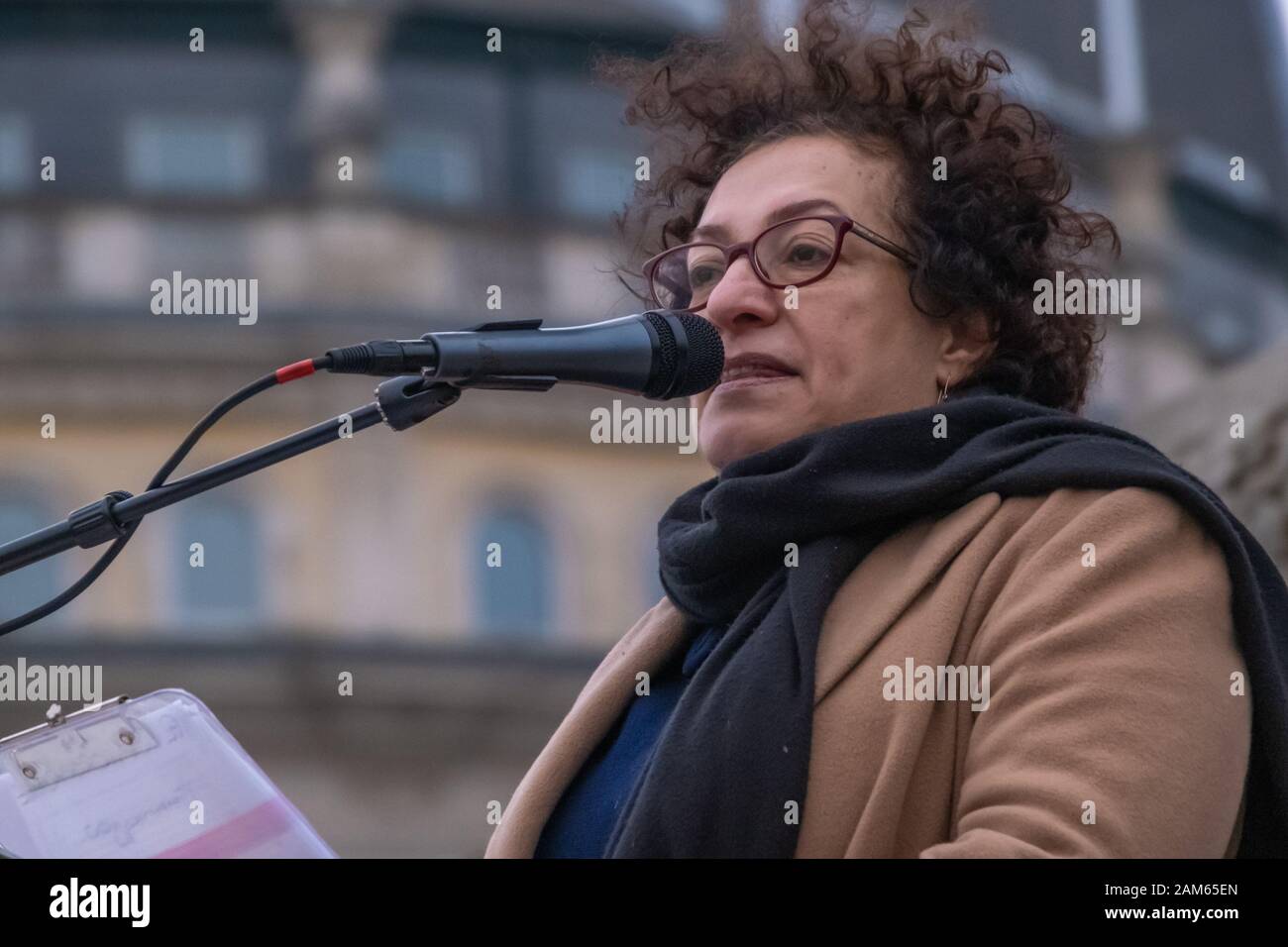 London, UK. 11th January 2020. An Iranian woman activist speaks at the Stop the War and CND rally in Trafalgar Square following President Trump's act of war in ordering the assassination of Iranian general Qassem Soleimani in Baghdad, contravening international law and increasing the risk of a major war in the Middle East. Speakers included Lindsey German, Steve Hedley, RMT, Jeremy Corbyn, Diane Abbott, Bruce Kent, Tariq Ali, Sami Ramadani and Andrew Murray. Peter Marshall/Alamy Live News Stock Photo