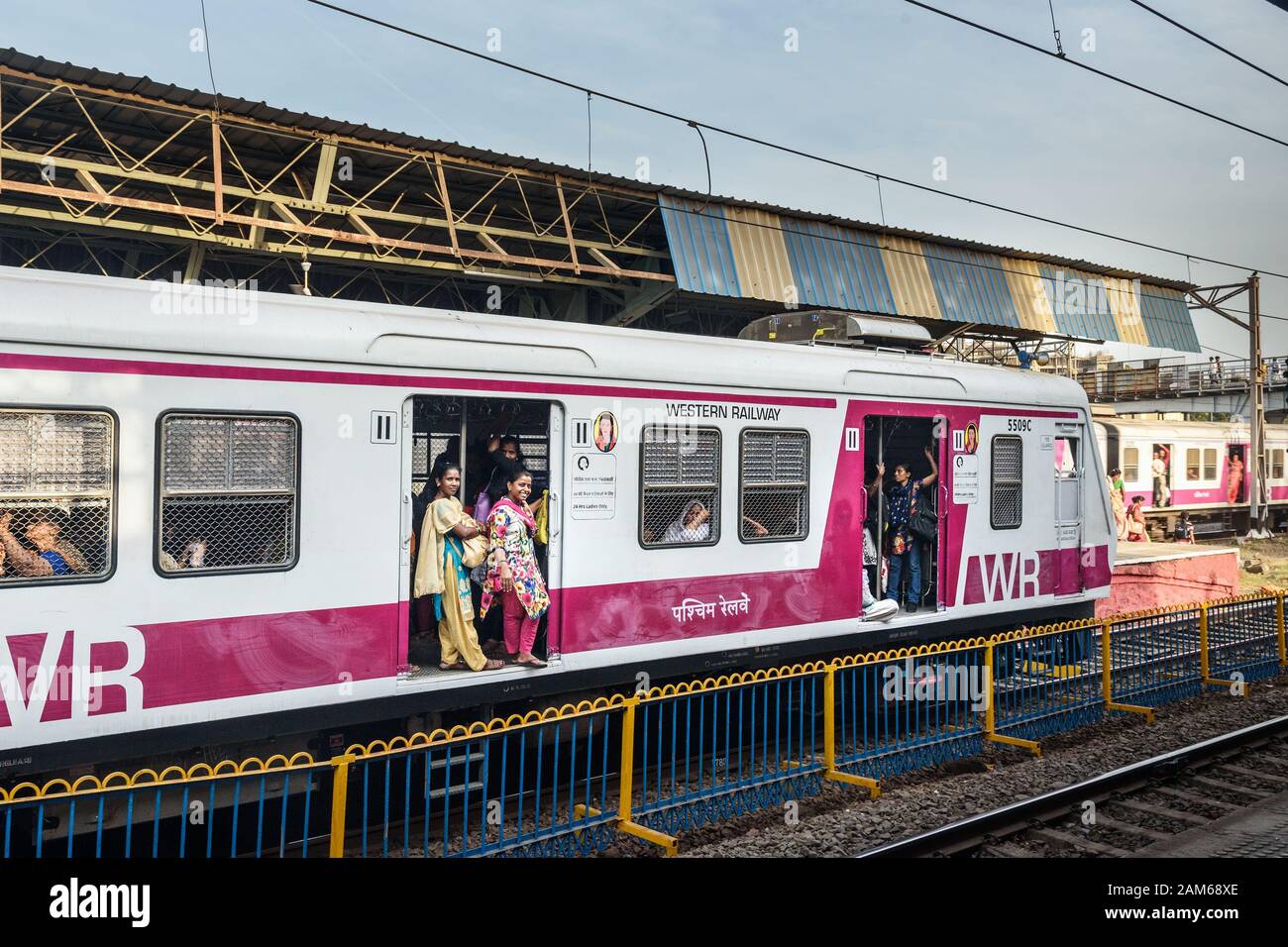 Local train at railway station. Mumbai Suburban Railway. India Stock Photo