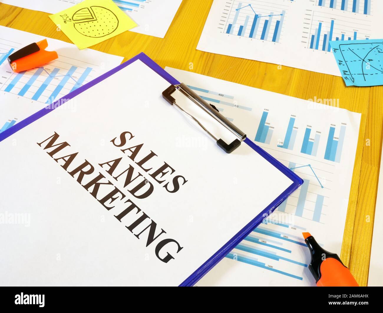 Sales and marketing papers and papers with charts Stock Photo Alamy