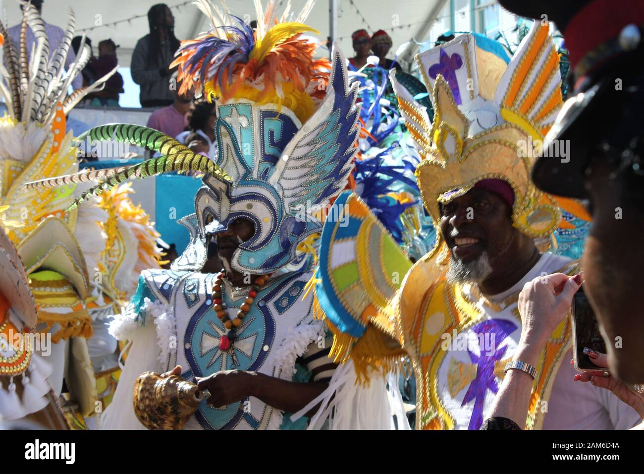 Men in bright colorful costumes at the Junkanoo street festival celebration in Nassau, The Bahamas Stock Photo