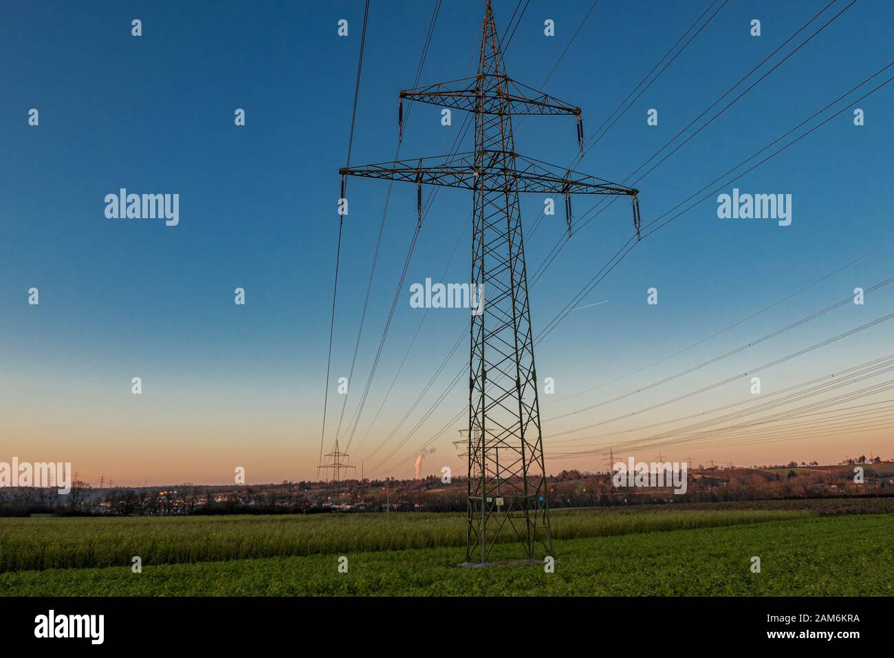 Power pole in the landscape with blue sky Stock Photo - Alamy