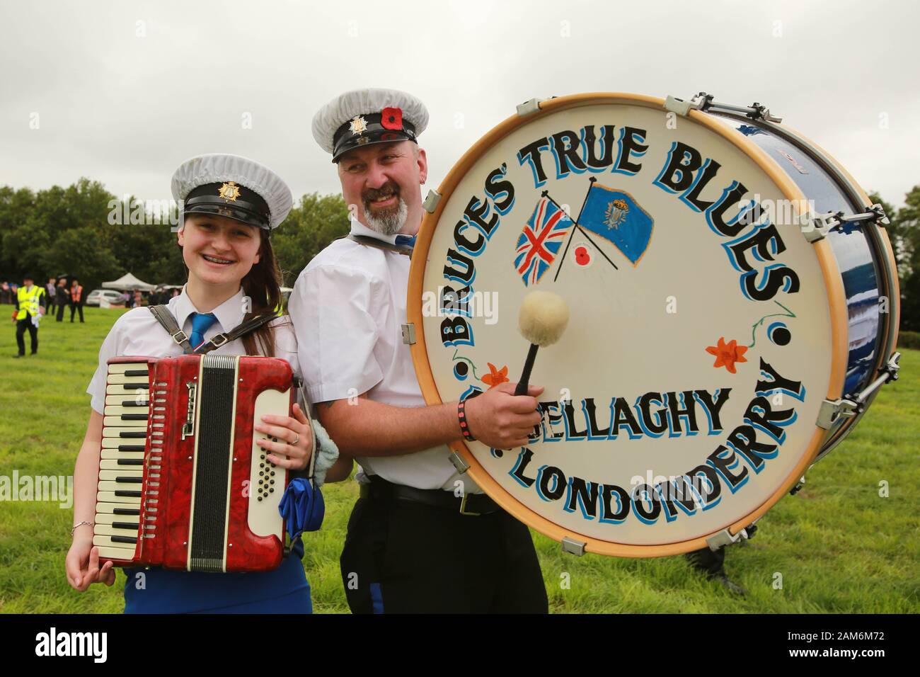 Grace Moore joins her father Mark Moore for the 12th demonstration in Ballyronan on the 12th of July 2019. (Photo by Paul McErlane) Stock Photo