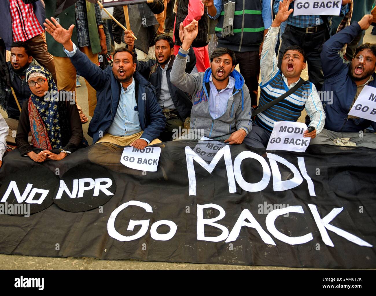 Kolkata, India. 11th Jan, 2019. Protesters hold placards while chanting slogans during the demonstration.Demonstration against the visit of India's Prime Minister Narendra Modi and also against (Citizenship Amendment Bill) or CAB which grants Indian citizenship to non-Muslims of Afghanistan, Pakistan and Bangladesh that was passed by the Indian Government in December 2019 and has created violence, strike and protest all over the India. Credit: Avishek Das/SOPA Images/ZUMA Wire/Alamy Live News Stock Photo