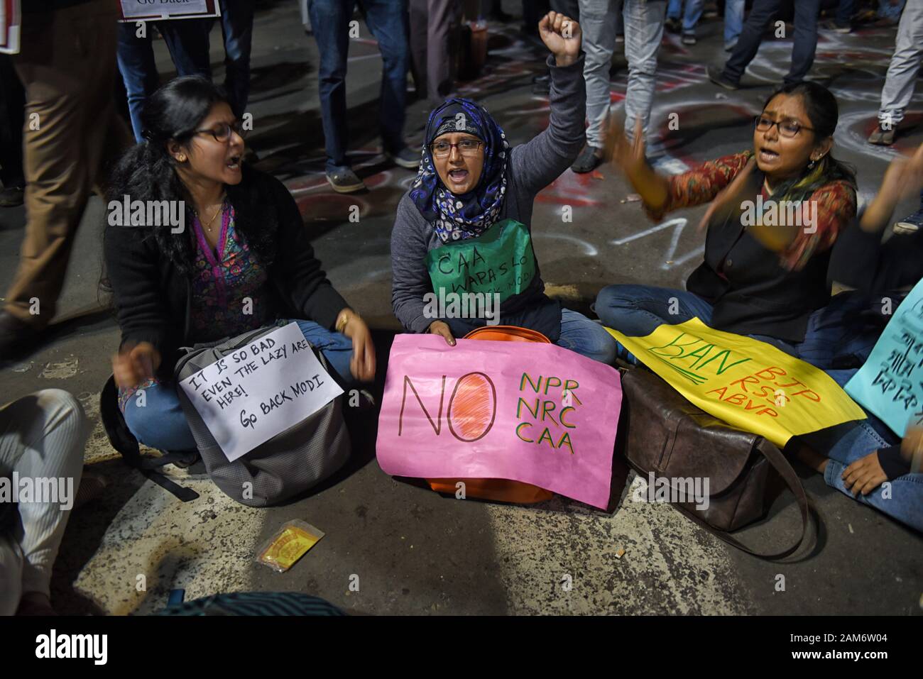 Kolkata, India. 11th Jan, 2019. Protesters hold placards while chanting slogans during the demonstration.Demonstration against the visit of India's Prime Minister Narendra Modi and also against (Citizenship Amendment Bill) or CAB which grants Indian citizenship to non-Muslims of Afghanistan, Pakistan and Bangladesh that was passed by the Indian Government in December 2019 and has created violence, strike and protest all over the India. Credit: Avishek Das/SOPA Images/ZUMA Wire/Alamy Live News Stock Photo