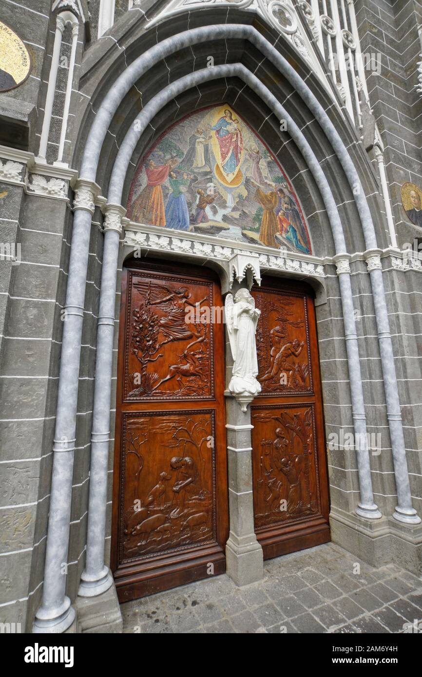 Carved-wood door with mosaic and ornamentation, Santuario Nuestra Señora de las Lajas (Las Lajas), Ipiales, Colombia Stock Photo