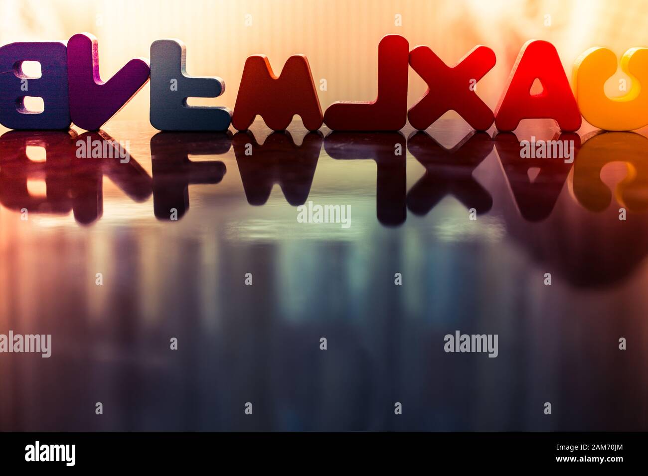 Colorful Letter cubes of Alphabet made of wood Stock Photo - Alamy