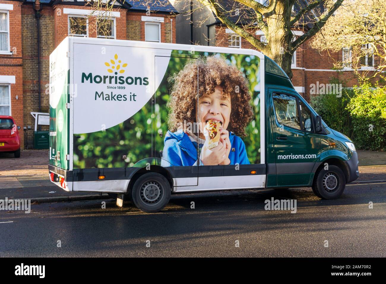 A morrisons.com online supermarket van delivering in a suburban road in South London. Stock Photo